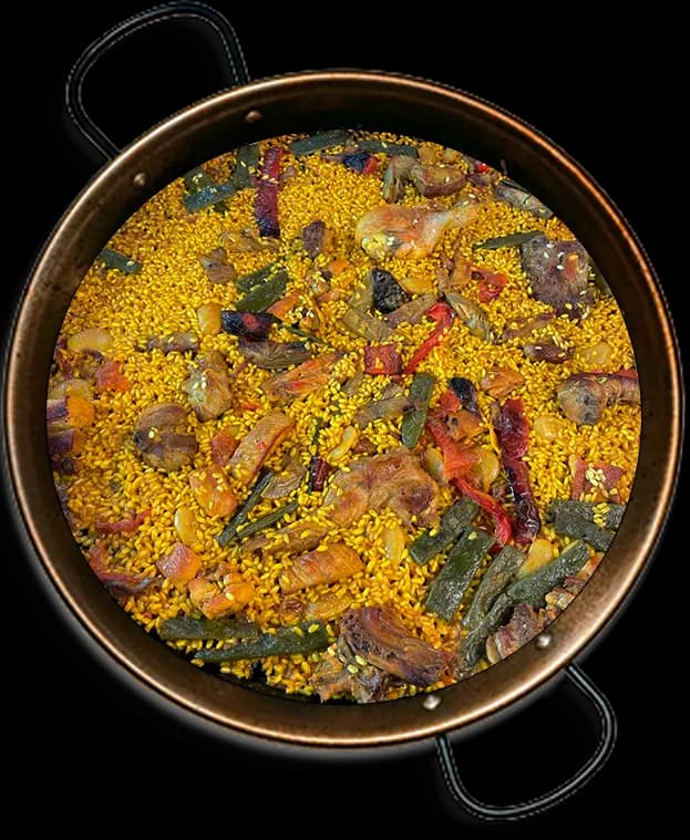 Paella valenciana con pollo, conejo y verduras